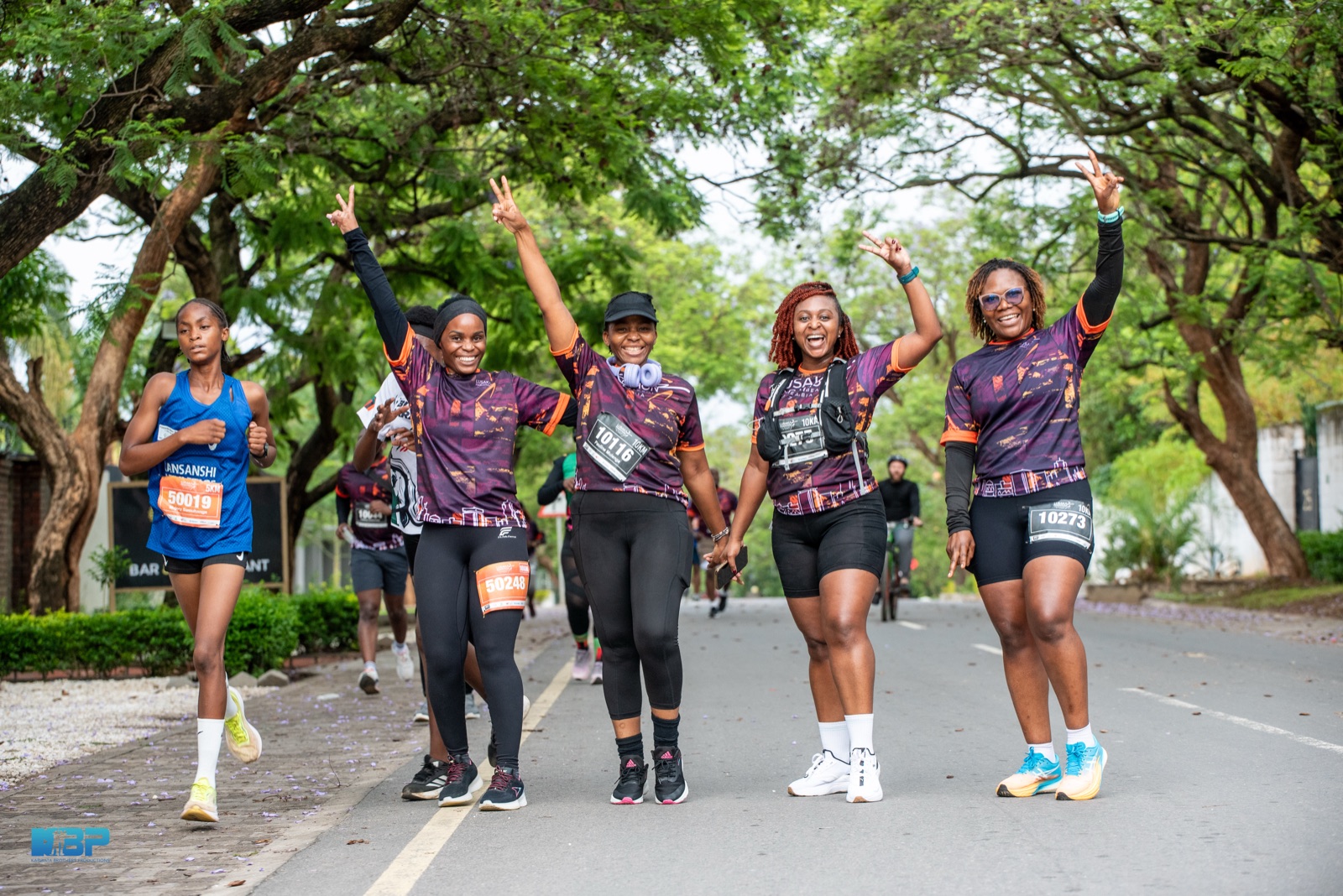 Runners pushing towards the finish line